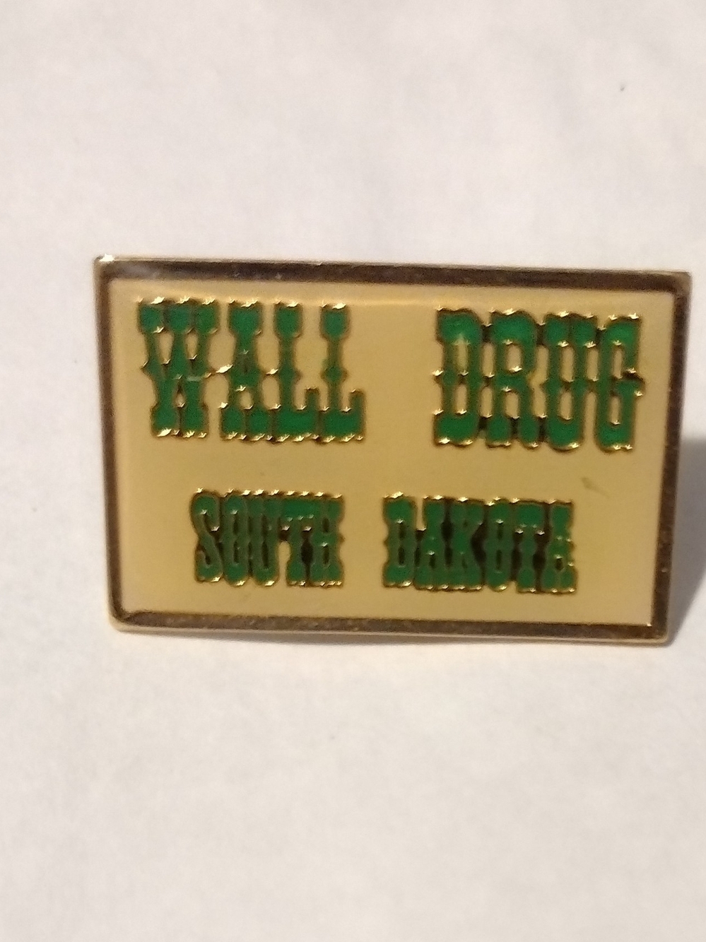 Wall Drug South Dakota Gold-tone Enamel Pin - Green on Cream Vintage